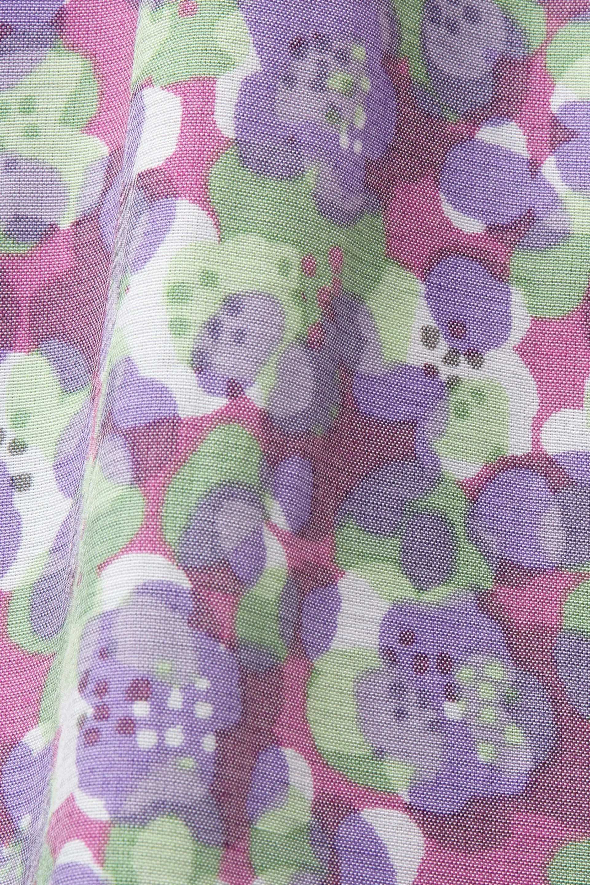 Blusa de cuello en pico con estampado