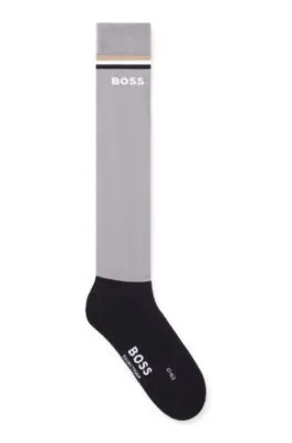 Calcetines de equitación con rayas y logo de la marca