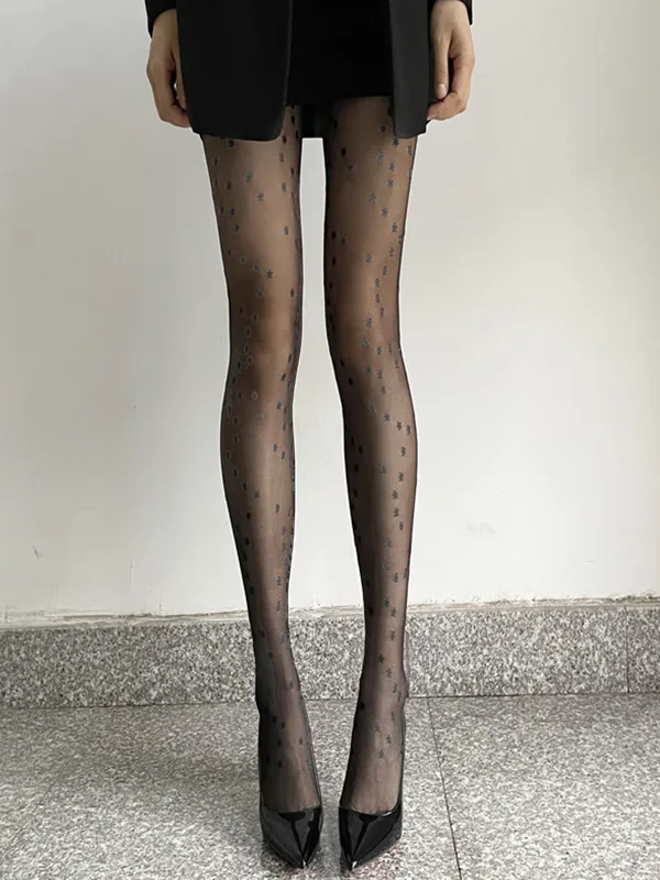 Medias negras transparentes con estampado de estrellas
