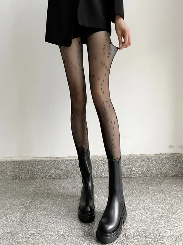 Medias negras transparentes con estampado de estrellas