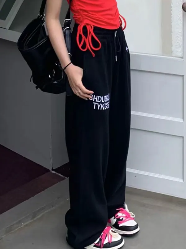 Pantalones deportivos con estampado de letras y bordado callejero