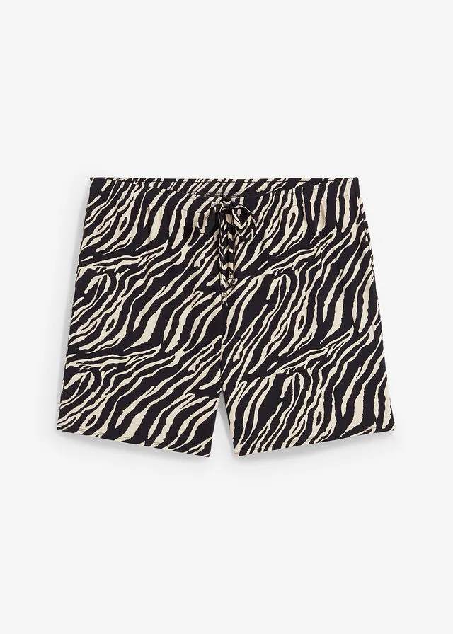 PANTALóN CORTO PLAYERO NEGROBEIGE CON ESTAMPADO DE CEBRA
