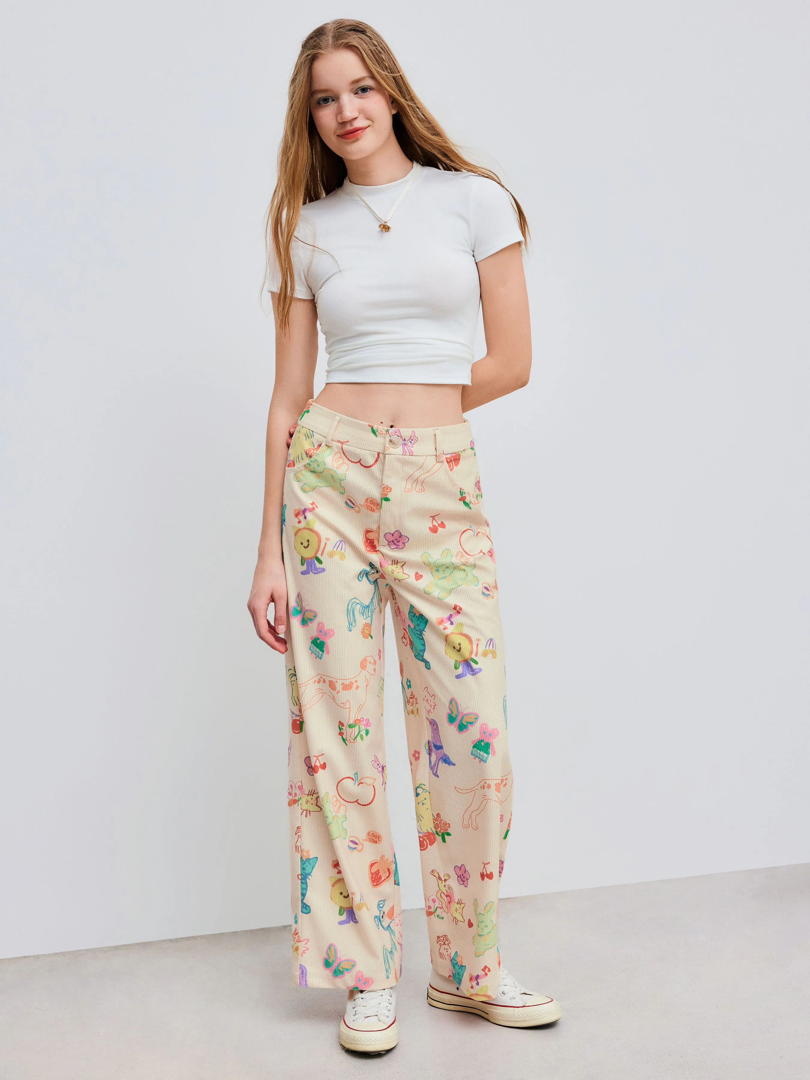 Pantalón de pana de tiro medio con gráficos de animales y frutas de pierna ancha