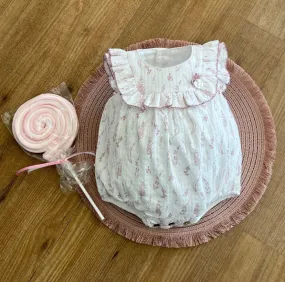 Pelele para niña con estampado ramilletes Colección Plane