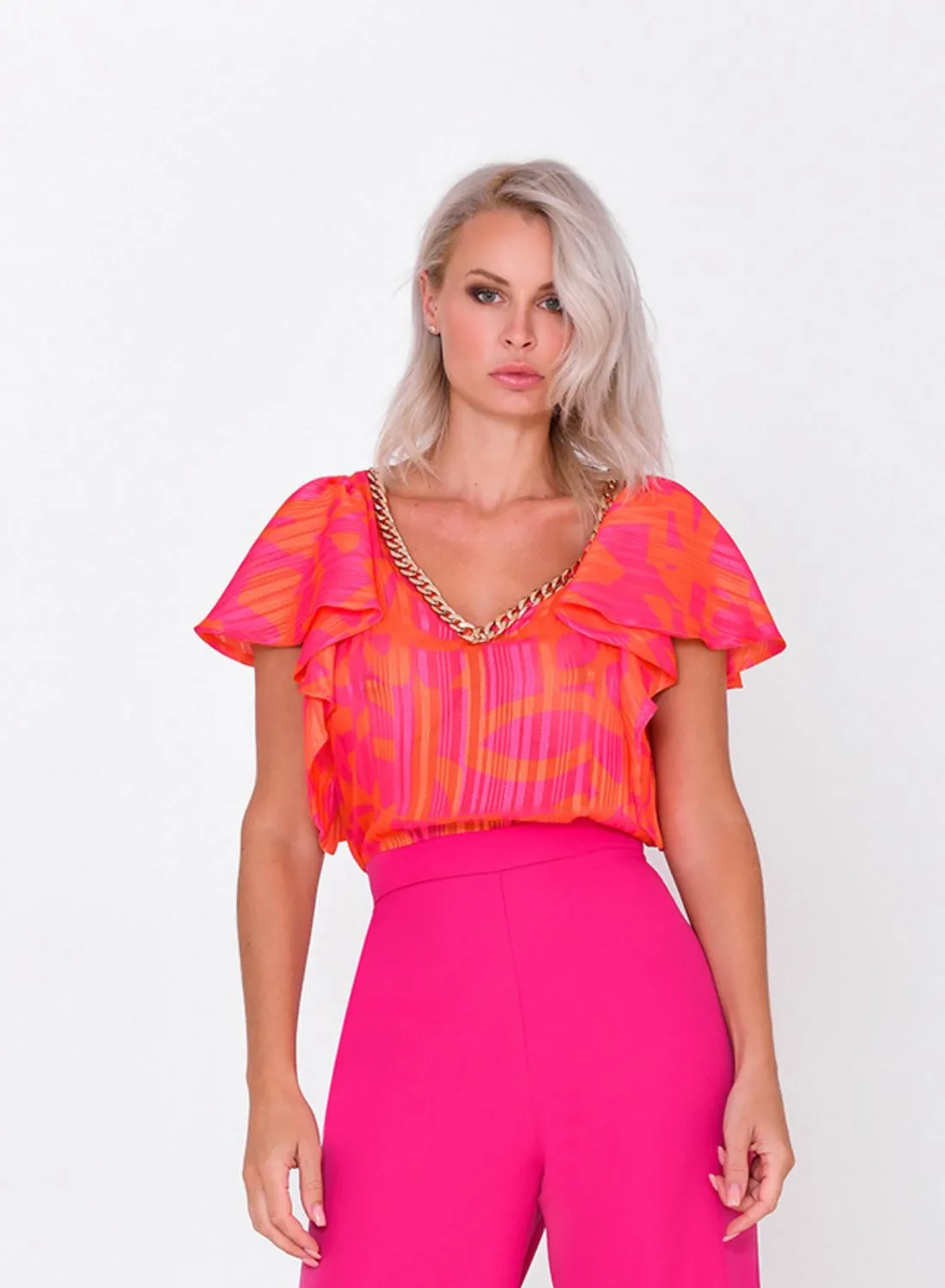 Top estampado detalle cadenas