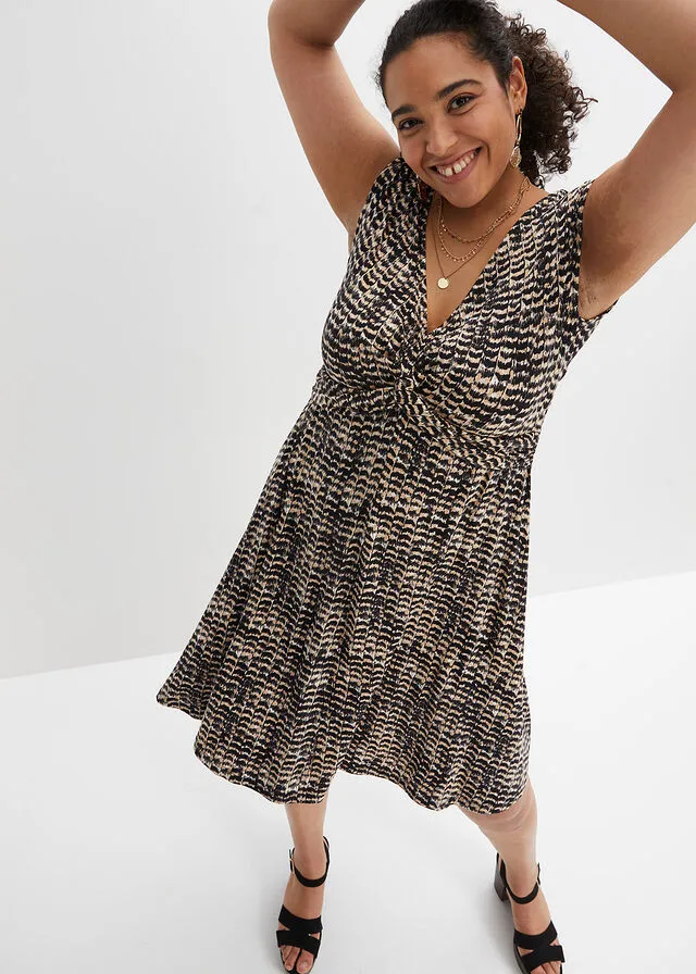 VESTIDO DE PUNTO BEIGENEGRO CON ESTAMPADO DE CEBRA