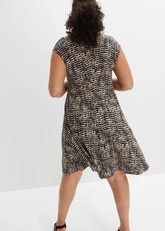 VESTIDO DE PUNTO BEIGENEGRO CON ESTAMPADO DE CEBRA