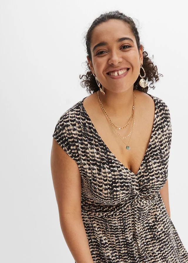 VESTIDO DE PUNTO BEIGENEGRO CON ESTAMPADO DE CEBRA