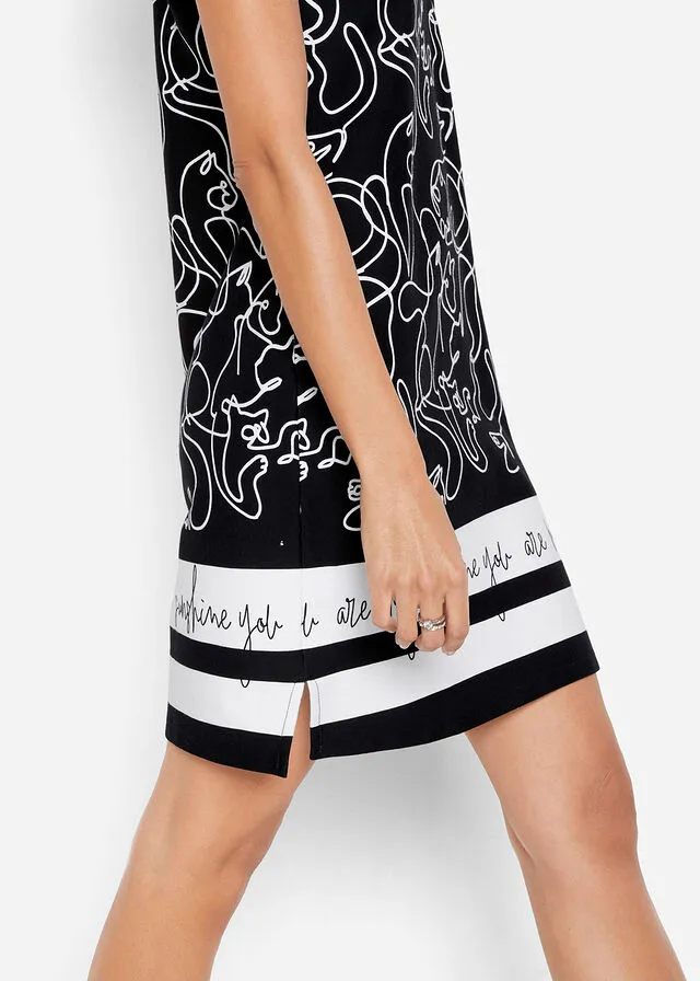 VESTIDO TIPO POLO CON LETRAS NEGROBLANCO ESTAMPADO